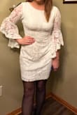 I got this in a medium to wear for my bachelorette. It was super comfortable, a little roomy, and a good length. Personally I wouldve liked it a bit more formfitting but I think the small might have been too tight. I thought the sleeves would be draping in my food at the restaurant but they weren't which was great. Only complaint is the Lace easily snagged on zippers, buttons, or Velcro. - Shannon U.