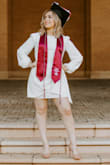 I purchased this dress for my graduation. It was perfect and got a lot of compliments on it. I'm usually a medium on everything so I purchased the medium and it fit perfect all around. You will not regret purchasing this cute dress. - Elizabeth T.