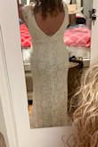 Little long so I'll have to hem up the front to walk on the beach but the XL is perfectly roomy and flattering for a relaxing small beach wedding. Material is gorgeous but the cost is small enough I won't mind sitting in the sand at times. Can't wait! - Crystal C.