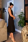Got so many compliments on this dress at a bachelorette celebration. Sophisticated and elegant, the silhouette is flattering and modest. Love the length of this dress, it really looks nice dressed up with a pair of pointed heals.
Fabric is thick and stretchy, love the zipper closure. And now details are so cute and feminine. I suggest steaming prior to wear, as the bows do get a bit crinkled in travel. - Samantha H.