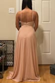 Finally found the dress to wear to a friend's wedding after weeks of searching. It is very flattering for a small chest, and the low cut on the sides of the boob isn't as daunting because there's not much there. :) I love that the straps are adjustable and the slit of course is flattering as well, especially for my height. I am usually a size 4/small but the small was way too loose on the bust area, about a full 4-6 inches if I had to take it in to be altered to fit my ribs. So the XS was what I went with! - Nicole S.