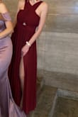 I am absolutely in love with this dress!
The dress fit perfectly. I bought size S. There was still space in the chest area even though I wore a strapless bra underneath.
Color was just like in the picture, red wine with the cooler undertone.
I made a slit from the middle of my thigh because I felt too covered in it.
Besides the small alteration I made I would totally recommend the dress, it was definitely flattering for my body shape (would recommend getting it shortened for someone who is smaller than 5'8 or not wearing heels). - Mirna S.