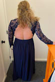 This dress fit great and I got a lot of compliments on it at a wedding I attended. It was the first dress I have ordered since undergoing reduction surgery last year, so I was dependent on their sizing guidelines.

I'm not super tall, so the dress was a bit long on me. I had to hold it up as I walked and danced, but if I had had the time a tailor could have fixed that easily. 

The sleeves were a bit loose and I ended up rolling them twice so they became tight right below my elbow. I think this still looked good, and it helped me from dipping my sleeve in dinner.

Even with some of it running a little large, I would have gotten the same size due to the waist which fit well. 

Overall I'm very happy with the purchase, I hope I find another event to wear it to in the future. - Courtney B.