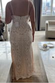 I loved this dress, the only thing was the slit was VERY high, just a little too high for my comfort. Other than that it's great and beautiful! Note I'm very curvy in the hips, so maybe if someone is more straight hipped the slit won't be as revealing! - Marissa C.