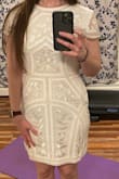 The pattern is beautiful and I would say this dress fits true to size but was too big for me. I'm normally a small but was hesitant to would be too tight. The bottom half fits perfect if you're curvier on bottom but the waist is too loose. There was about an inch on either side that stuck out b/c it's shaped to create a waist. Also don't wear dark underwear as you can see... - Megan M.