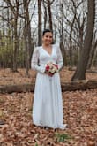 In the beginning, I ordered a medium size but it was a little loose for me, I could change it just on time to a small size for my wedding. The fabric is so soft and it has two layers on the skirt so there's nothing you can see under. And the details in the back, what a dream. I would recommend it to all my friends, also the customer service is really kind!! - Pilar R.