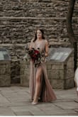 I wore this as a bridesmaid dress and it was super comfortable. I originally ordered a small but exchanged it for a medium only because I have a wide rib cage and wanted room to breathe and be comfortable. - Alison K.