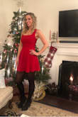 I wore this to a work Christmas party and it was perfect! Paired it with black panty hose and cute closed toe heels. Got so many compliments. I love the fit of this dress&.not too short, but still playful and sexy. - Jamie H.