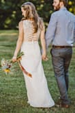 I got married in this little beauty last year and it fit like a GLOVE. It was pretty long on me (I'm 5'1) so I had to hem it up about 6 inches, but fit everywhere else perfectly. Very comfortable and lightweight! Be sure to have a steamer handy-- the fold wrinkles from shipping didn't fall out on their own. - Julia S.