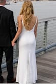 I tried soooo many dresses and decided on this one. I did have it hemmed a couple of inches because I was getting married outside in the winter. Straps also need to be taken up. Other than that, it was perfect! Oh and no undergarments, you can see every line if you try to wear even the thinnest undergarments. It is fully lined so really not necessary anyway. - Trisha C.