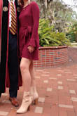 Very comfy and cute dress. Wore it for a graduation and it was warm but not too thick or anything. The tie wrap was a little weird - I had to tie it pretty tight so that it would lay flat and in line with the hemming. But I got many compliments and liked it! Sleeves cute but a bit annoying if you're doing much with your hands. - Sydney