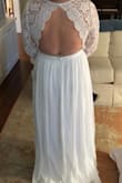 Love this dress! I was worried about the back because of my broad shoulders but it actually somehow made them look more delicate. The macrame like material on top is very sturdy and pretty. This wasn't THE dress but I'm keeping it anyway for bridal shower - Stacey B.