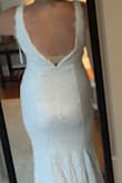 This dress felt well made and thick yet comfortable. The lace on the top around the neckline gave it a delicate and classy look. This wasn't the one for my adventure elopement but it's a beautiful dress. - Stacey B.