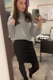 I love the neckline of this sweater! Super soft material I will be nervous to wash it! Love the big sleeves it makes it fashionable, the sleeves will stay up on your upper arm easily and will not fall back down unless you tug it down. I feel super comfortable and cute wearing this sweater. Easy to tuck into bottoms too because it's not a super thick sweater. :) - Rachel B.