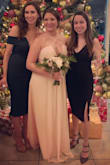 This dress is the perfect knee-length dress for a petite person. The material is thick and also has a lining. I was able to zip it myself easily.  Very comfortable and does have some stretch to it. Wore it to a December wedding and loved it! - Kimberly H.