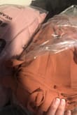 I love the material and the fit. It's lightweight and super flowy! Will have to get it tailored as it's still too long even with heels. However, the dress I received is much darker than what appears in the photos and reviews. Not sure if there are filters being used, maybe it's just the lighting, or maybe it's just how it looks next to my pale skin, but unfortunately the dress is too dark of a pink for the wedding I will be attending. I attached a photo of the dress next to another pink dress. I am keeping the dress though as I personally love it! - Nicole F.