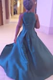 I bought a medium and it fit like a tailored glove. My husband was very impressed - the dress is absolutely stunning in person, it's very well made, and so much fun to wear! I received endless compliments all evening while we attended a Brian McKnight concert to kick off my 50th Birthday weekend. 

BONUS: It has pockets!! - Mia J.