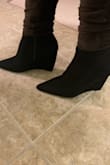 They run tts, got my reg 6. Were on sale so I couldn't resist. Very pointed so isn't much of comfort walking. Soft fabric though. Looking cute as well. - Tanya S.