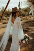 I wanted a boho dress for my elopement but didn't want to spend a ton of money. This dress was of amazing quality, so beautiful & perfect for my day!!! I received so many compliments and everyone was so shocked when I told them the price. :) Thank you for making my wedding day so special and making me feel so beautiful!!! I typically wear a size small or size 0/1, I ordered an x-small and it fits like a glove! Shipping was also very fast! - Juliana R.