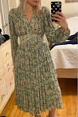 Waist is a little tight, but very flattering and beautiful. I get a lot of compliments every time I wear it! - Nina R.