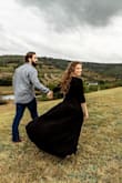My fiancé and I had engagement pictures out at a beautiful ranch and I wanted an outfit that didn't compete too much with the beautiful nature. I have also gained some weight and felt like this dress covered all the right spots so I still felt confident. I did have to pull up my top a bit so I might have done some breast tape next time and the wind caught the slit a few times but it turned out pretty. It's comfy and elegant. I can rewear this in the future for sure! I love a wrap dress and especially a classic black piece! - Julie W.