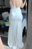 This dress is beautiful and fits really well. As with most maxi dresses, it is quite long, I'm only 5'2". The back of this dress is the show stopper! The front is plain yet very pretty and well made. I didn't choose this dress because it seemed more casual than the other lace dresses I ordered. - Jennifer R.