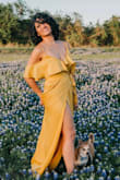 Bought this for a photoshoot and loved how flowy it was! The top is a little loose but it has a button that helped secure it so it wasn't an issue! - Dianna V.