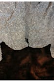 I wore this for a party.  Party lasted 4 hours and suddenly the shirt kept slipping down!  It was wriped at both straps.  Never made it through one party.  Have no idea how it happened either. - Noriko H.