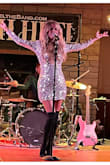 I front a cover band out Omaha and for New Year's Eve I made a grand entrance to the stage in this sparkly sequin dress. A BIG HIT! The compliments were over the top. Although a deep V-neck, it's not too low, and the dress stays in place, as I do a lot of moving around and raising my arms while performing. It fits PERFECTLY! I'm 5'8", 120, and ordered the size small. The dress is gently lined and has just the right amount of spandex that gives your figure a nice hug, but not too tight, to help hide body imperfections. - Lisa L.