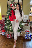 Love this! Paired it with sequin joggers for our Christmas Eve gathering and I loved it! Super comfy. It is more of a cropped sweater so keep that in mind. Perfect to dress up or down! True to size. I ordered a Small. - Tiara K.