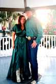 This dress was a beautiful emerald color the fit was great very flowy and the wrap around style is very flattering. I wore this for Christmas dinner and loved it! My only complaint would be I could not get the wrinkles out with my steamer and had to iron it as it came pretty wrinkled. If you are thinking about getting this dress get it !! - Scott S.