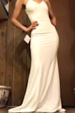 I will be wearing this for my elopement. Honestly was amazed by how perfect it was. No alterations are needed! It is a bit long. But I think it's fine once I get heels. I'm usually a 000 and the XXS fit just right. It's very stretchy and comfortable. Just great quality. I'm so happy with it! The pictures I took obviously didn't do it justice lol. I had to screenshot from a video. But the dress is gorgeous! You won't regret it! - Brianna P.