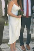 Super cute! Love the material. Wore it for my courthouse marriage. Wanted something simple but cute and it was perfect. It was a little tight in the bust but otherwise fit perfectly. - Jansu Y.