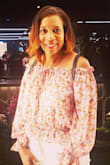 I like the versatility of this off the shoulder too. I can wear on my shoulders for work clothes then off for fun.

I wish it slightly longer. I have long stem Nd the sleeves git. The body of the shirt doesn't appear crop but you must wear it as such - Darche B.