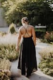 I bought this dress for my senior photos! It was long on me, but I had it altered. A little loose in the chest area. The skirt was so pretty for my photos; it flows neatly when you move. Really simple, but the back is a statement on its own (and you get to show off sports bra tan lines!). I have a pretty rectangular, athletic body but the movement of the skirt gave the illusion of curves :). Definitely can (and will) wear this for any more-formal events. - Sophie W.