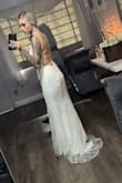 I loved this dress, I had it altered cause it was a little long and had a slit added. So beautiful. - Martha F.