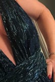 I chose this dress for a NYE party downtown Chicago & it made me feel like a million bucks! I got so many compliments from so many people - men & women, younger & older. The color & sparkle was so beautiful. The fit was flattering, and I love that I didn't have to wear a bra or any painfully restrictive undergarments. I was so comfortable all night whether sitting or dancing. I did have about 4 inches of length taken off the bottom as no high heel could help keep it off the floor. But the seamstress said it was a super easy hem and it only cost me $25 with a $10 rush fee included! Even with the hem, this dress was worth every penny and then some! I did use some double stick tape to ensure I wouldn't have any gapping (or nipple gate) when I danced or had my arms around my hubby. I'm not sure it was necessary as I am somewhat small chested. I'm so thankful I found this dress and even though my event is over I still feel excited remembering how I looked and felt! - Bridgette L.
