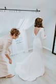 My now-husband and I planned our wedding within one month, so I didn't have time to order from a typical bridal shop. I ordered this gown not knowing what to expect - I wouldn't have picked any other dress in the world. It was absolutely perfect and classic. I get so many compliments on my gown. Thank you for making such affordable and stunning options for brides to be! - Marla C.