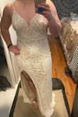 I am wearing this dress for my rehearsal dinner for my wedding in Mexico. The dress was not super long so I don't have it hemmed as long as I wear heels. The slit on the leg comes up to a perfect spot and the material is stretchy but still of great quality. The sequin design is super cute and doesn't rub too much on the arms, all around a great dress. Can't wait to wear it on my day! - Bailey C.