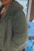 Bought to wear over a bridesmaid dress at an outdoor January wedding. Kept me warm in 37-degree weather. Comfortable and loose-fitting so I was able to dance the night away comfortably. Can't find to find a reason to wear it again. - Kimber M.