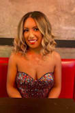 I don't normally buy strapless dresses. They don't suit me well but I loved this one. I got so many compliments. It is very short but that didn't bother me. I also like that the bottom part has some kind of elasticity which prevent the dress to ride up. - Ivon B.