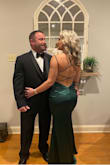 The dress was absolutely beautiful. It fit perfectly. The back is the best part of it. I had many compliments. - Shawn M.