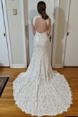 I chose this dress as my wedding dress. It is very flattering on me and fits perfectly around my hips. I just had to get the top part altered a bit, but otherwise is a great fit. - Angela B.
