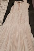 The dress is absolutely stunning. The pictures do not do it any justice. The quality is amazing. Would recommend anyone debating on buying it to buy it now!!! - Seerah C.
