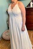 Bought this dress for my upcoming backyard wedding. Love the feel and look. Very comfortable and great material. Need to have it shortened a little but that's it. Can't wait for my big day!!!! - Mindie R.
