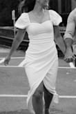 I sized down when I originally bought it to size XS, but it fits perfectly throughout all seasons of my body. It has some stretch so even if I weigh a little more, it still looks great and hugs my curves in the most flattering way. I wore this to my bridal shower and got so many compliments. - Emily G.