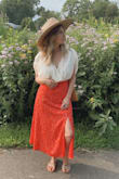 Absolutely adore this skirt. Always love a dress/ skirt with a slit moment, because at 5'3" it helps elongate my legs to make me appear taller. Love!!!! - Mary K.