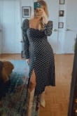 Fits really well. Love the polka dots, sleeves, and slit. Paired it with some ivory boots. - Mary K.
