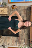 It is a beautiful dress. My daughter wore it for snow ball . We did have to hem it, sew the silt shut some and sew cups, in the chest are it was a little loose . Over all it was a great buy .I also took some of the fabric from the hem and made a ribbon to tie on the straps - Laura J.