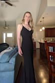 I wore this for my sister's wedding and loved it. My measurements were between a small and medium, and I'm happy I went with medium. It was fitted, but room to comfortably walk. The material feels high quality. - Katherine D.